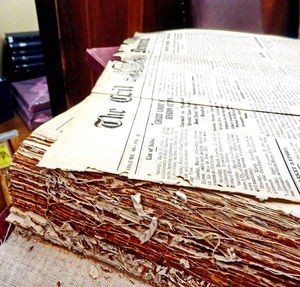 The Historical Society of Cecil County (Md.) implemented a number of strategies to preserve aging documents, such as the bound records shown here, and to make the materials available in modern formats.