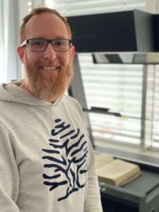 Florian Wandel in front of his Zeutschel OS C Overhead Book Scanner
