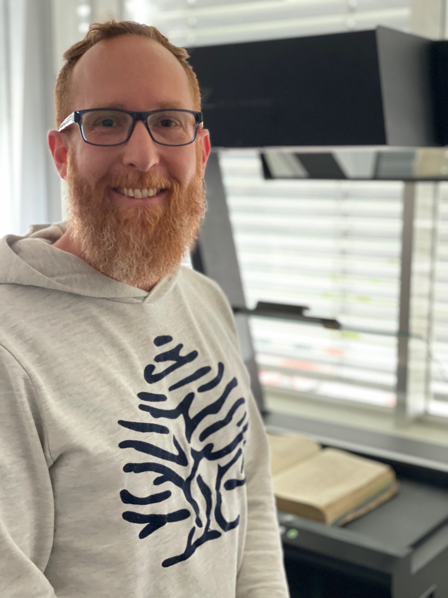 Florian Wandel in front of his Zeutschel OS C Overhead Book Scanner 