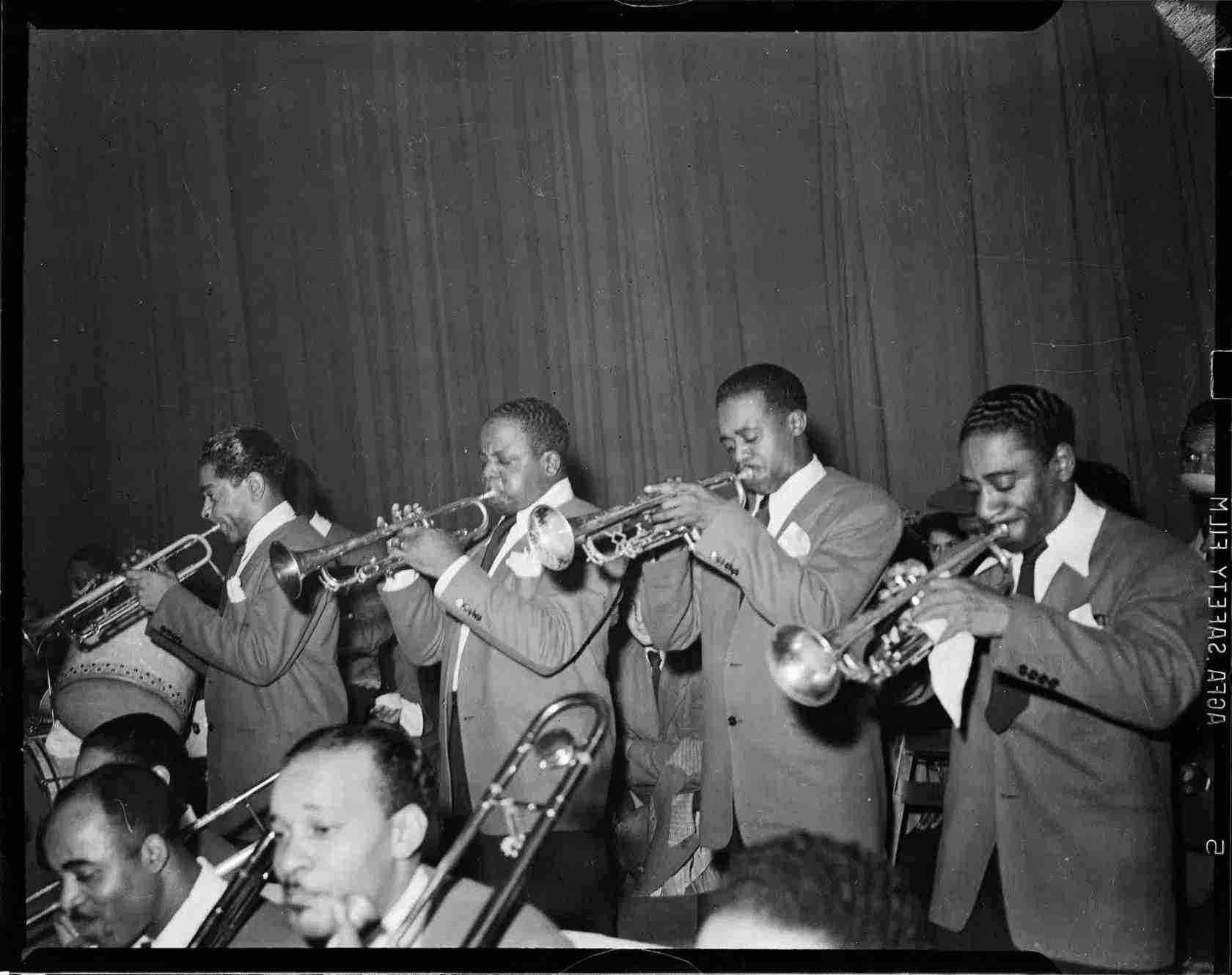 Brass section of the Billy Eckstine Orchestra, performsat Hill City Auditorium (Savoy Ballroom), Pittsburgh, October 1944.